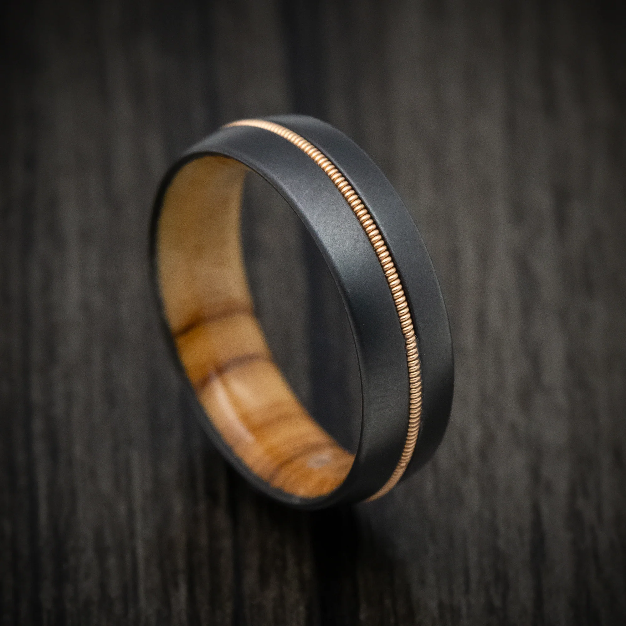 Black Zirconium Men's Ring with Guitar String Inlay and Wood Sleeve