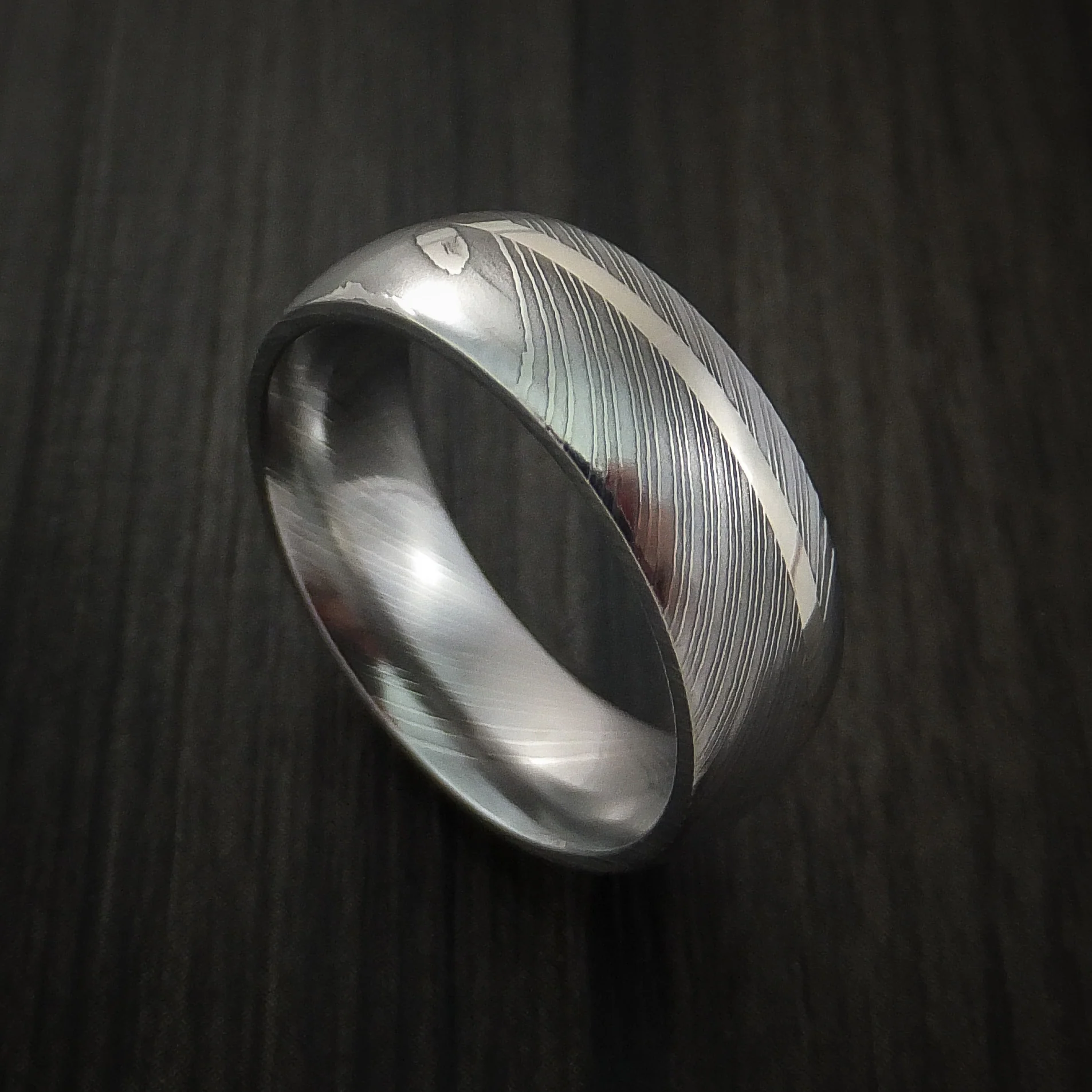 Polished Domed Damascus Steel Men's Ring with Off-Center White Gold Inlay