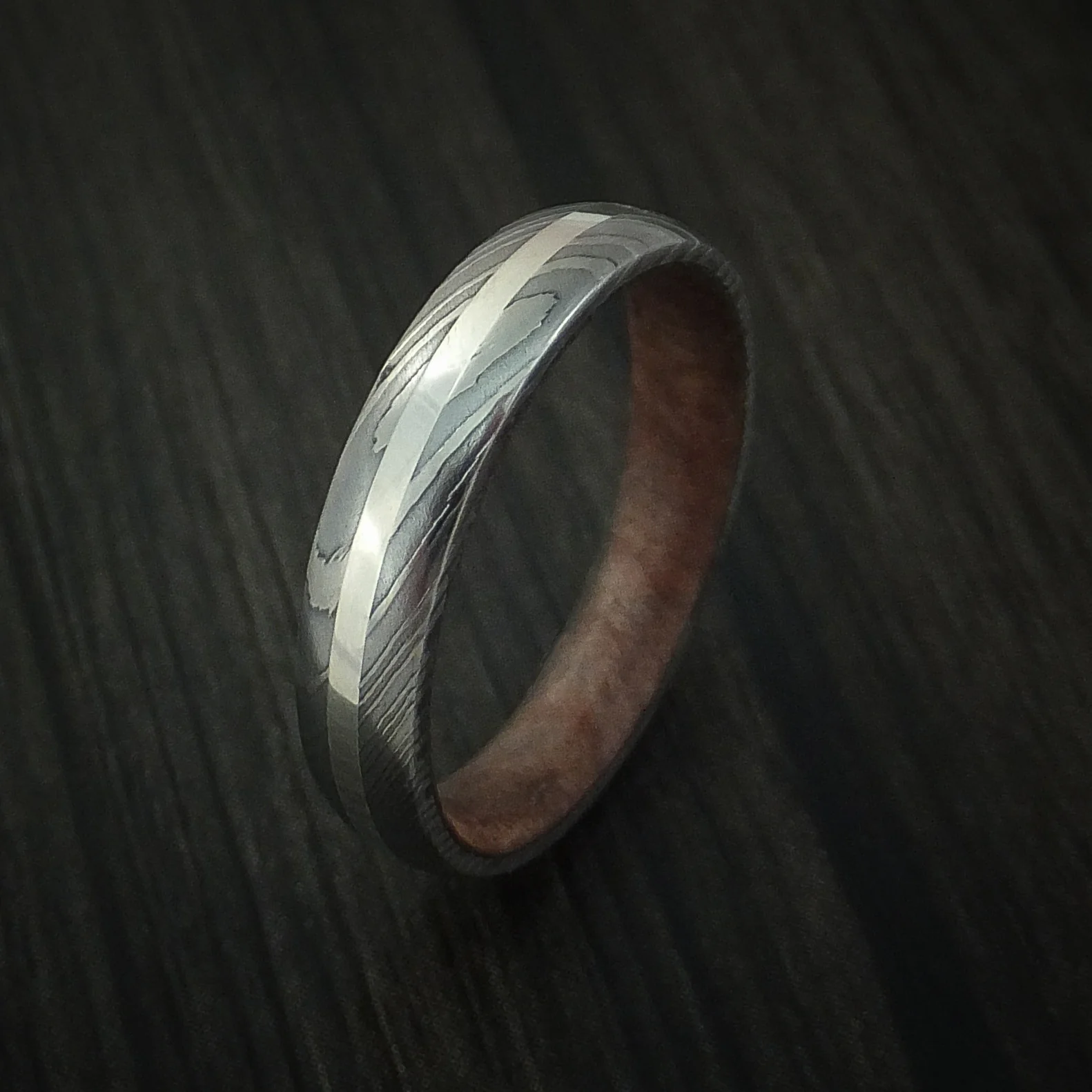 Damascus Steel Ring with Silver Inlay and Hardwood Sleeve - Image 3
