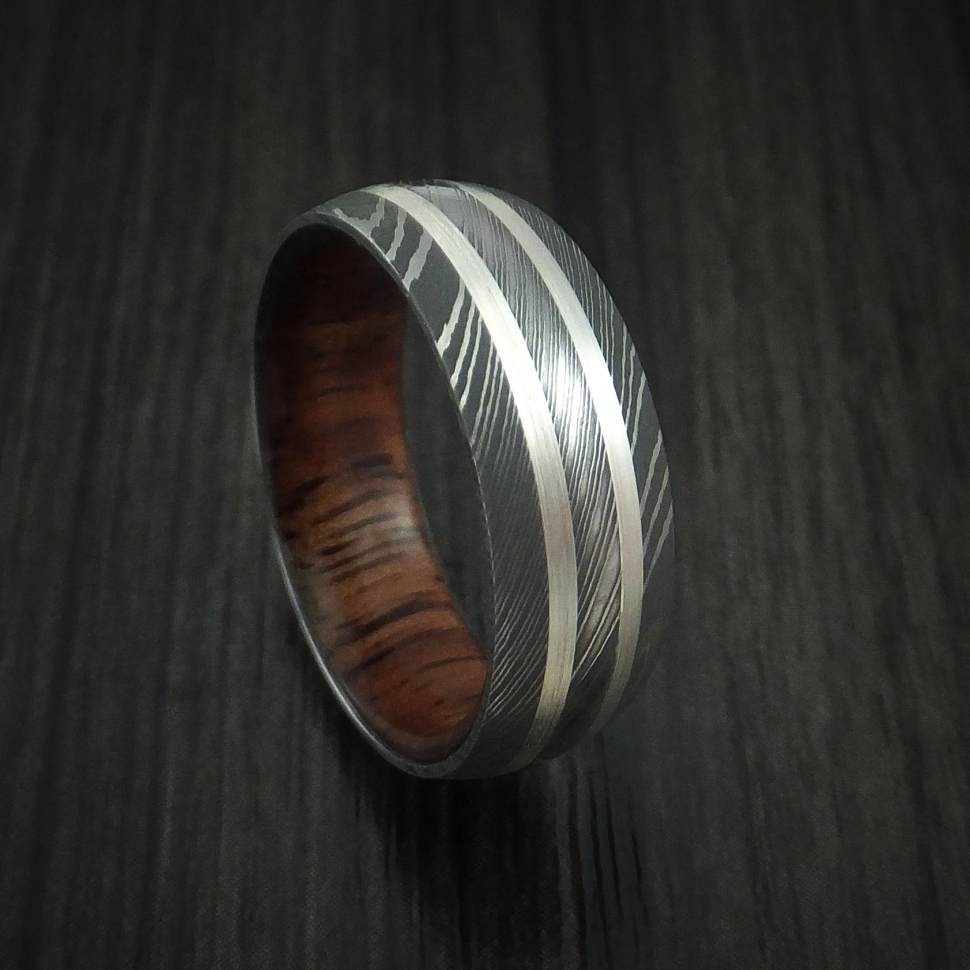 Damascus Steel Men's Ring with Silver Inlays and Koa Hard Wood Sleeve