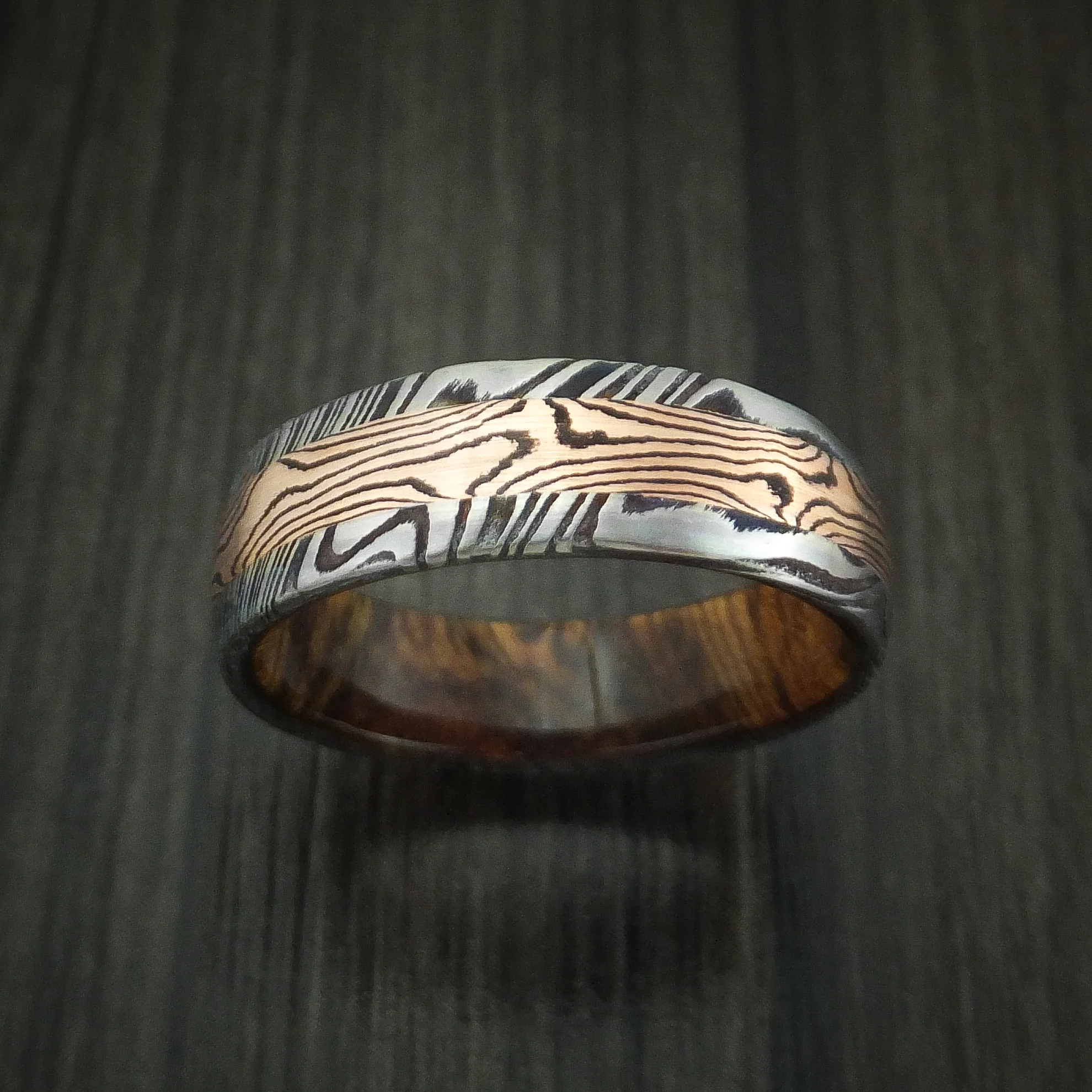 Woodgrain Kuro Damascus Steel Men's Ring with 14K Rose Gold Mokume Shakudo Inlay and Desert Ironwood Burl Wood Sleeve Custom Made Band - Image 2