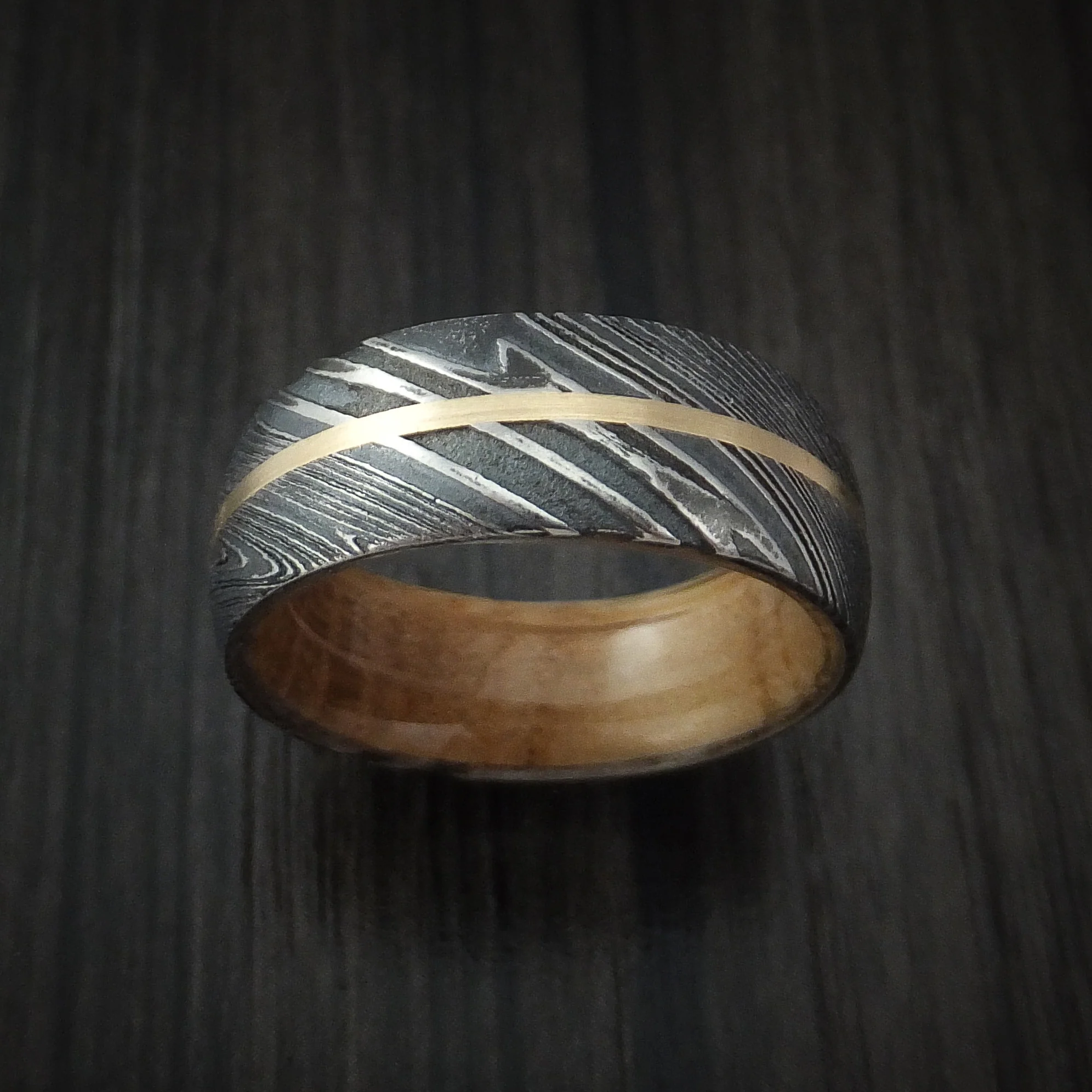 Woodgrain Kuro Damascus Steel Men's Ring with 14K Yellow Gold Inlay and Whiskey Barrel Wood Hardwood Sleeve Custom Made Wood Band - Image 2