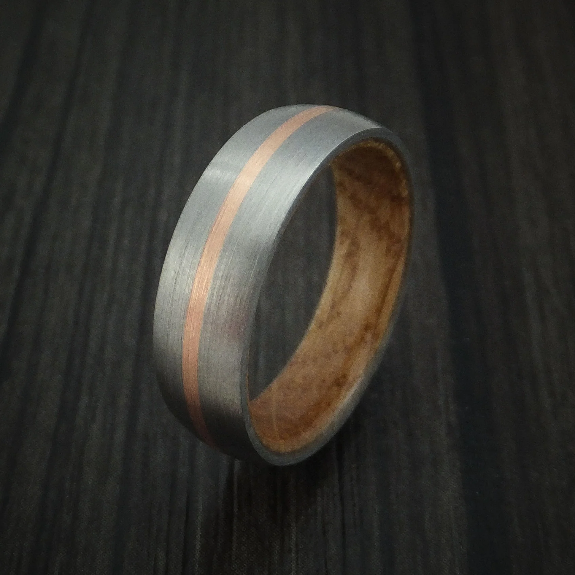 Titanium Men's Ring with 14k Rose Gold Inlay and Whiskey Barrel Wood Sleeve - Image 4